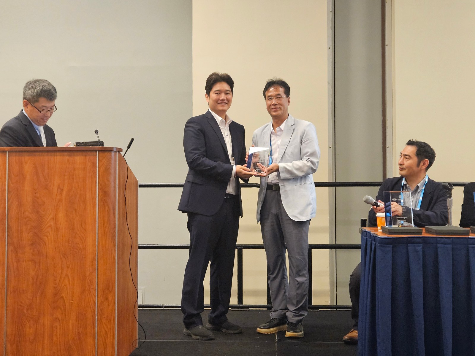 Receiving the International Symposium Award — 5th KSMP-JSMP-KAMPiNA Joint Symposium at AAPM, 2025